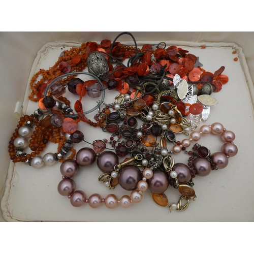 317 - Small group of costume jewellery to include bead necklaces, coral necklace, pair of Capodimonte wall... 