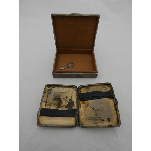 323 - Silver cigarette case, monogrammed, 92g, and a silver engine-turned and cedar-lined cigarette box.&n... 