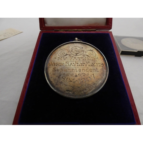 327 - Edwardian silver engraved medallion, awarded 1910, 60g, in fitted tooled case, and a commemorative c... 