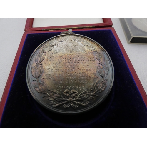 327 - Edwardian silver engraved medallion, awarded 1910, 60g, in fitted tooled case, and a commemorative c... 