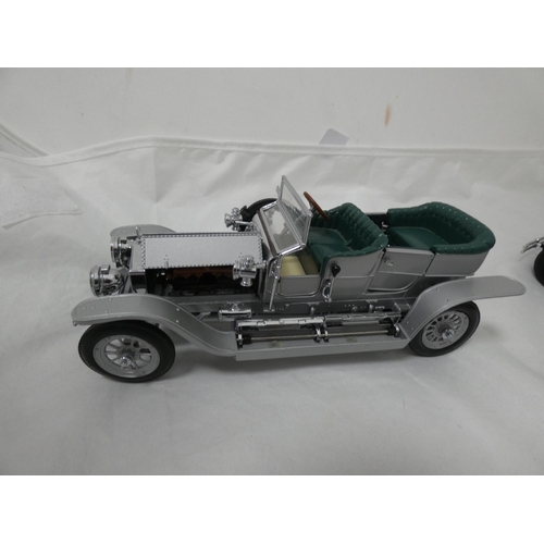 330 - Four Franklin Mint diecast scale models of classic cars to include a 1929 Rolls-Royce Phantom 1, 190... 