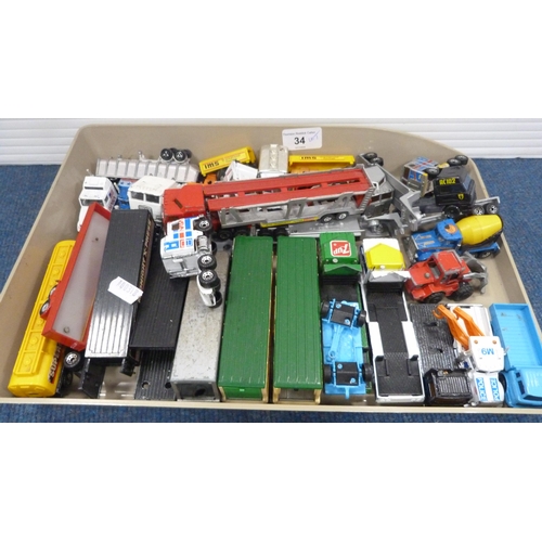 34 - Five small cartons containing a large quantity of diecast and plastic playworn vehicles to include M... 