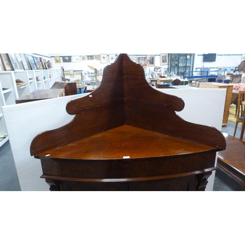 344 - Antique mahogany corner cupboard with an adapted gallery top.