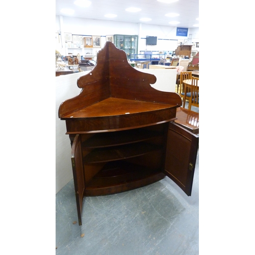 344 - Antique mahogany corner cupboard with an adapted gallery top.