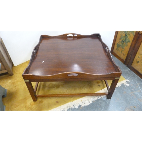 374 - Large stained wood coffee table with tray top.