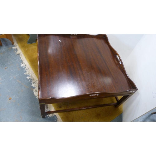 374 - Large stained wood coffee table with tray top.