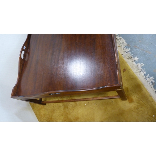 374 - Large stained wood coffee table with tray top.