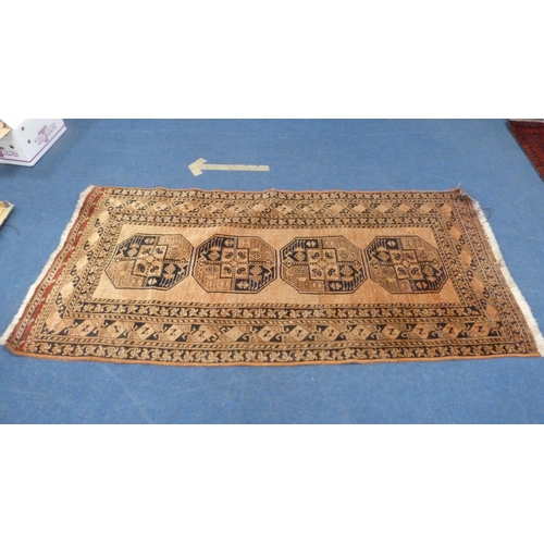 379 - Afghan Bokhara hand-knotted rug with four geometric medallions to the centre, red and black field on... 