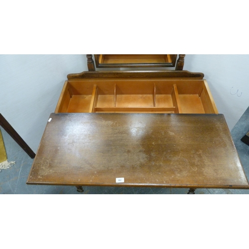 382 - Oak dressing chest with an unusual sliding top section enclosing a fitted interior.