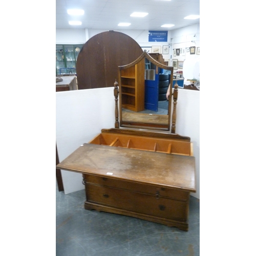 382 - Oak dressing chest with an unusual sliding top section enclosing a fitted interior.