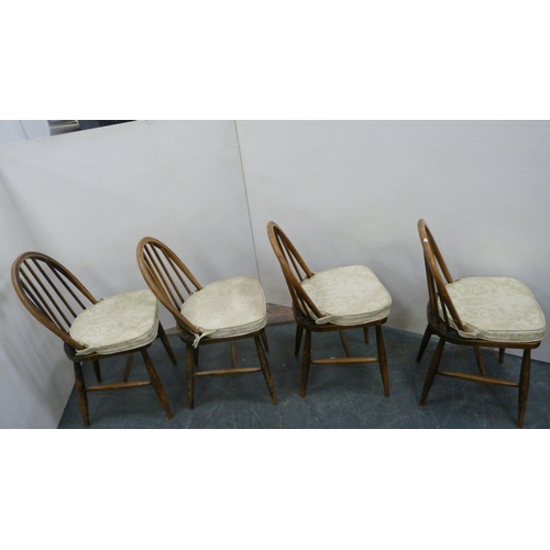 386 - Oak peg-jointed gate-leg table and a set of four Ercol Windsor-style quaker chairs.  (5)