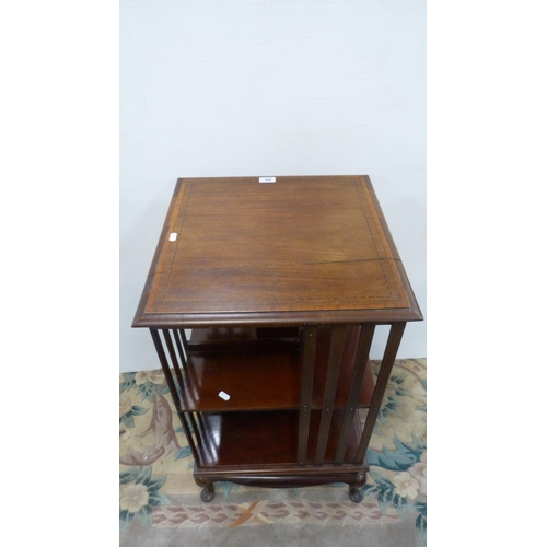 395 - Edwardian inlaid mahogany revolving bookcase.