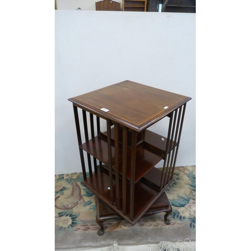 395 - Edwardian inlaid mahogany revolving bookcase.