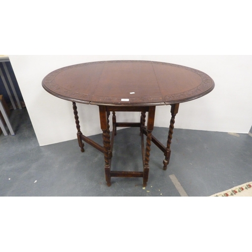 397 - Oak barley-twist drop-leaf table.