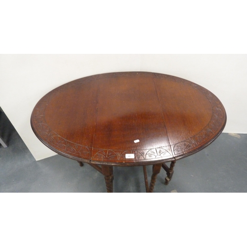 397 - Oak barley-twist drop-leaf table.