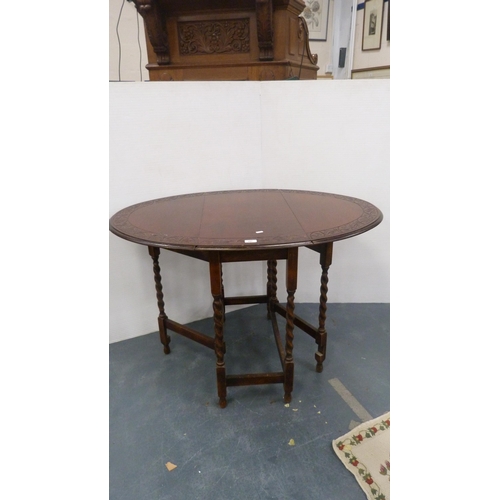 397 - Oak barley-twist drop-leaf table.