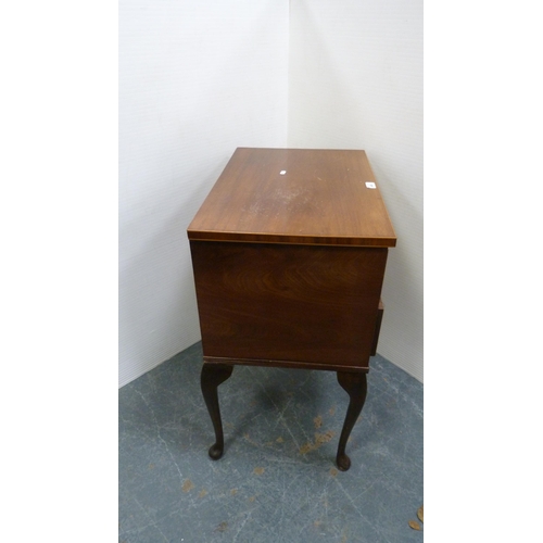 408 - Mahogany two-drawer chest of drawers of small proportions, on cabriole supports and pad feet.