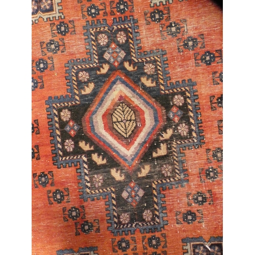 412 - Turkish Heriz-style hand-knotted rug, blue and brown field on red ground.