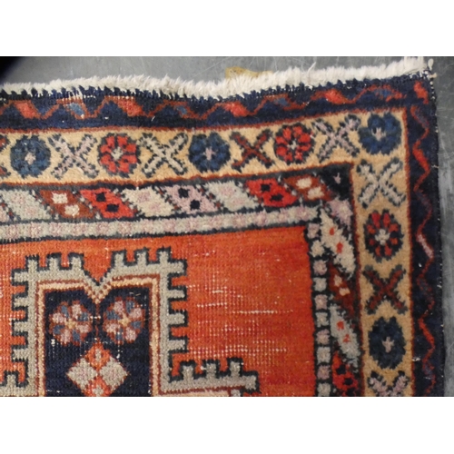 412 - Turkish Heriz-style hand-knotted rug, blue and brown field on red ground.