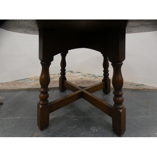 418 - Oak coffee table and a pair of wrought iron and burr kitchen stools.  (3)