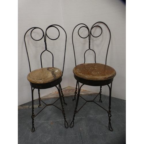 418 - Oak coffee table and a pair of wrought iron and burr kitchen stools.  (3)