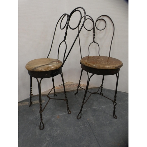 418 - Oak coffee table and a pair of wrought iron and burr kitchen stools.  (3)