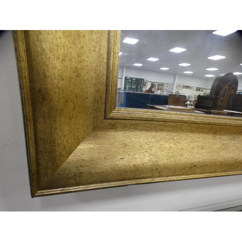 420 - Contemporary gilt framed wall mirror.