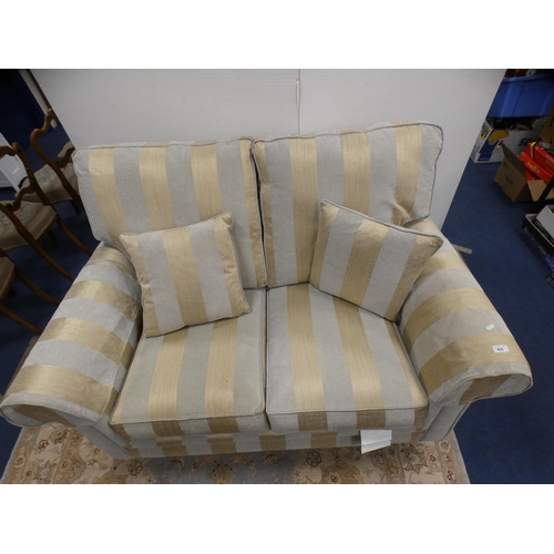 429 - Contemporary two seater sofa with striped upholstery, on brass caps and castors, by Alstons.