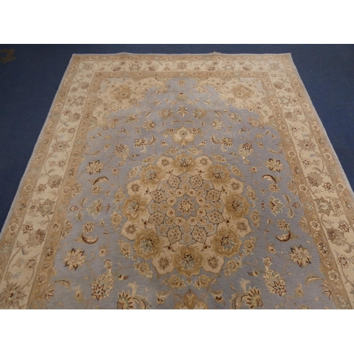 430 - Large Persian design machine-made by Oriental Carpets Limited, with all over floral swags, on blue a... 