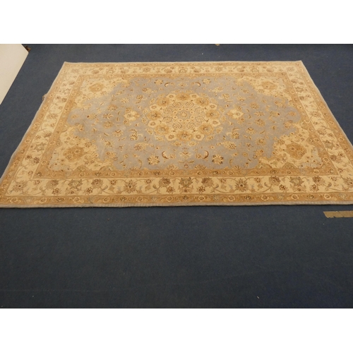 430 - Large Persian design machine-made by Oriental Carpets Limited, with all over floral swags, on blue a... 