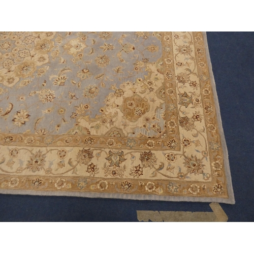 430 - Large Persian design machine-made by Oriental Carpets Limited, with all over floral swags, on blue a... 