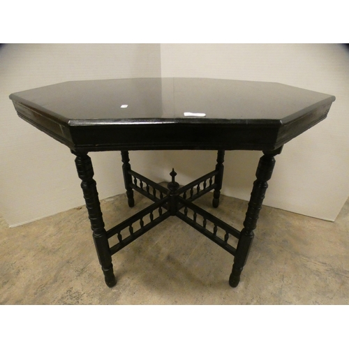 459 - Ebonised octagonal window table, c. early 20th century.