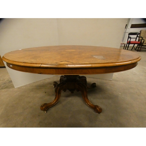 460 - Victorian burr walnut oval breakfast table with snap-action tilt top.