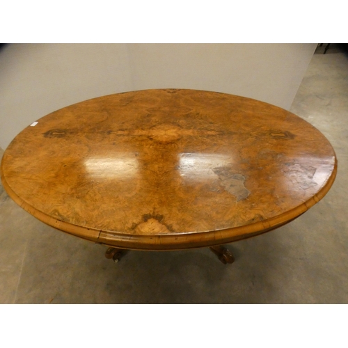 460 - Victorian burr walnut oval breakfast table with snap-action tilt top.