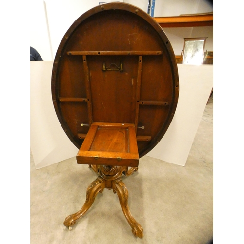 460 - Victorian burr walnut oval breakfast table with snap-action tilt top.