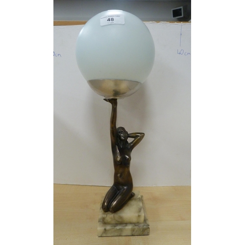 48 - Art Deco-style bronzed table lamp in the form of a kneeling nude female holding a spherical shade, o... 