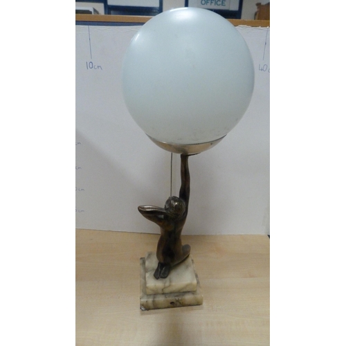 48 - Art Deco-style bronzed table lamp in the form of a kneeling nude female holding a spherical shade, o... 