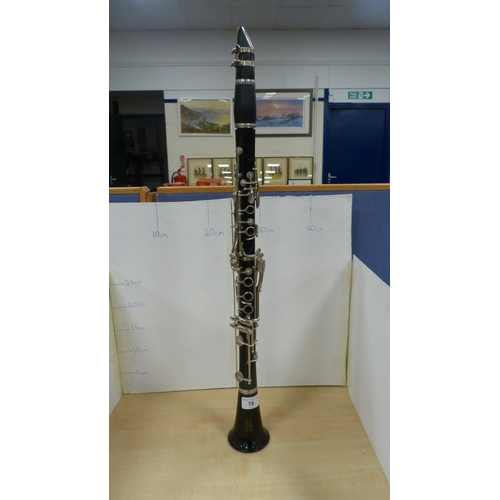 78 - Boosey & Hawkes 'Regent' B flat clarinet with accessories and book, in fitted case.