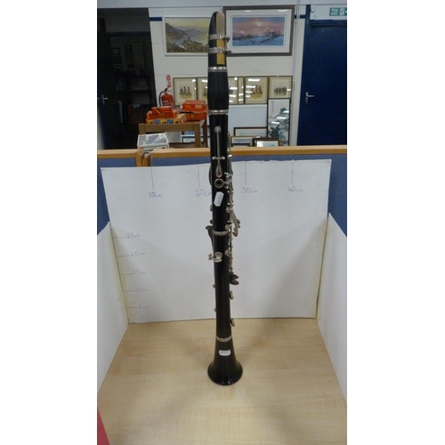 78 - Boosey & Hawkes 'Regent' B flat clarinet with accessories and book, in fitted case.