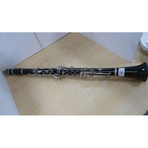 78 - Boosey & Hawkes 'Regent' B flat clarinet with accessories and book, in fitted case.