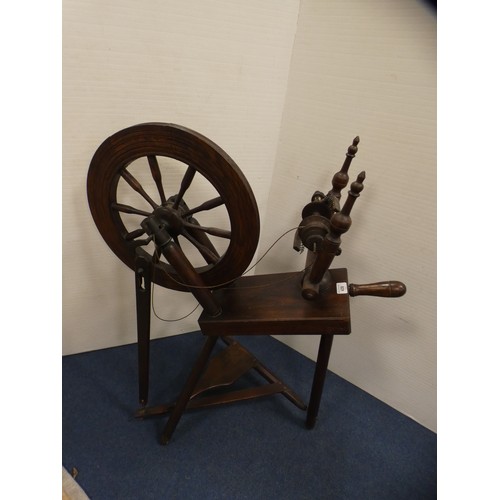 439 - Stained beech spinning wheel in the 17th century style.