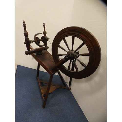 439 - Stained beech spinning wheel in the 17th century style.