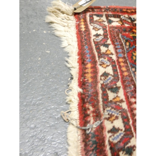 391 - Handmade Iranian red and cream rug L151cm x W105cm.