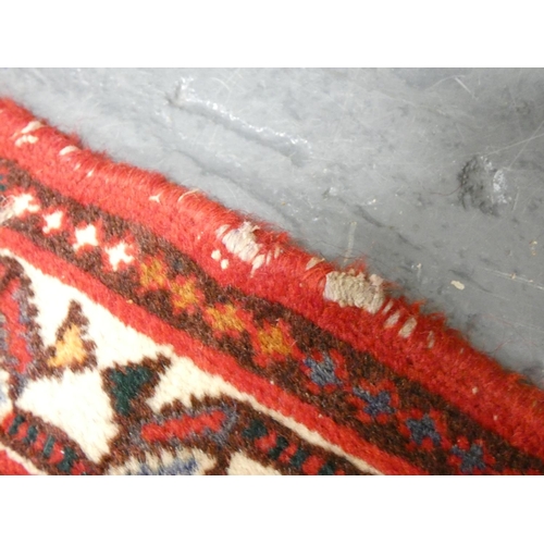 391 - Handmade Iranian red and cream rug L151cm x W105cm.