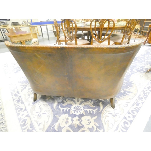 420 - 20th century Arts and Crafts two seater leather sofa along with two leather tub armchairs of studded... 