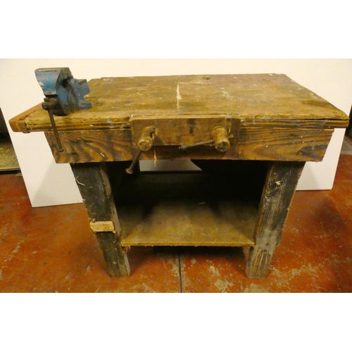 97 - Vintage pine work bench with attached metal vice, and a collection of tools to include saws, one exa... 