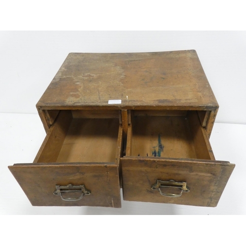 99 - Mid-century oak library index cabinet with four deep drawers, 40cm high, 51cm wide and 39.5cm deep.