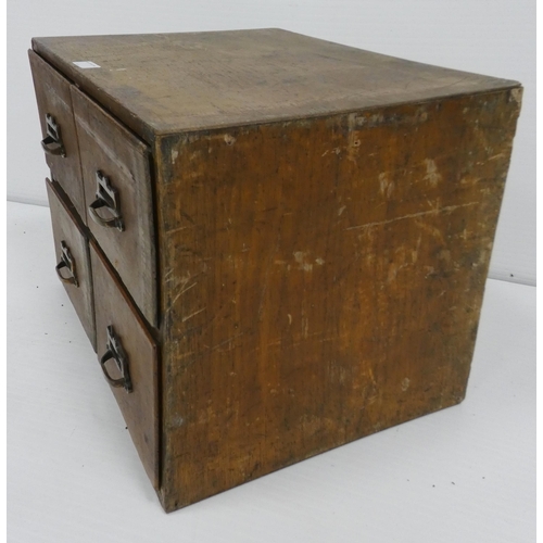 99 - Mid-century oak library index cabinet with four deep drawers, 40cm high, 51cm wide and 39.5cm deep.