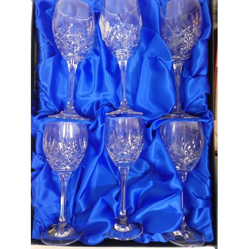 81 - Four boxed sets of crystal glasses to include a set of six Edinburgh Crystal wine glasses, six Bohem... 