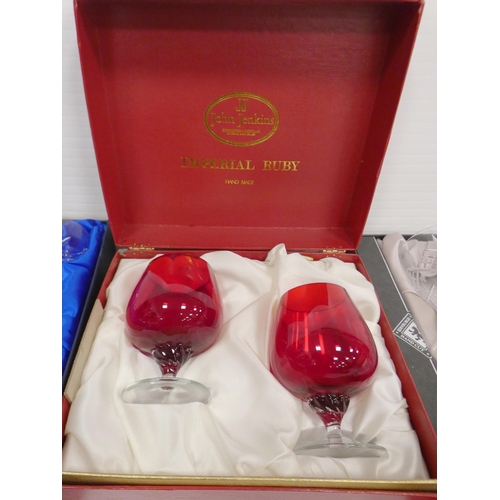 81 - Four boxed sets of crystal glasses to include a set of six Edinburgh Crystal wine glasses, six Bohem... 